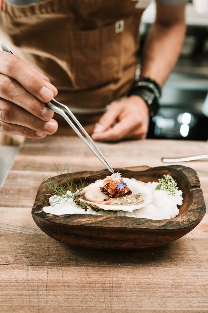 Person Holding Stainless Steel Fork